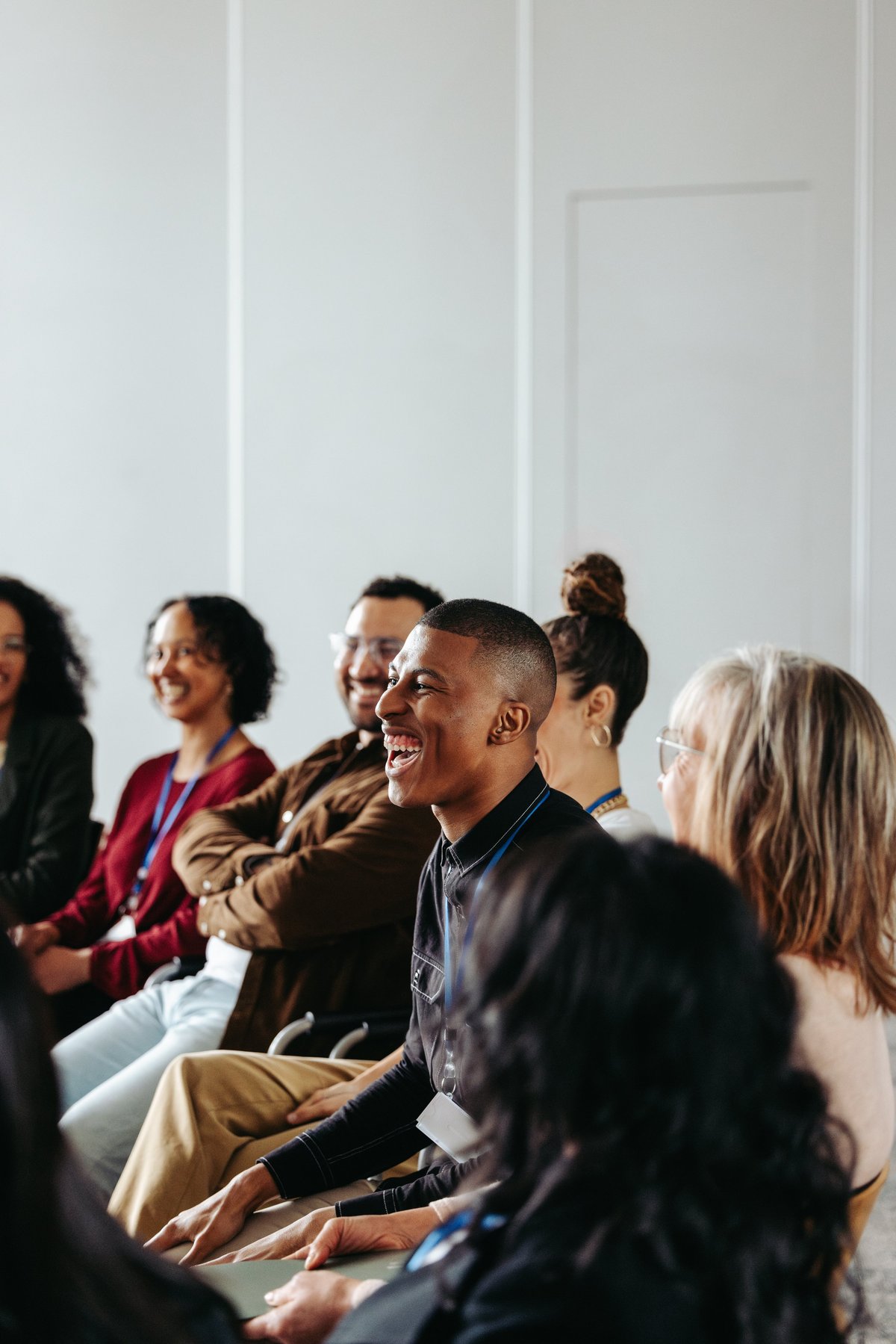 Wealth Within community members laughing and connecting together